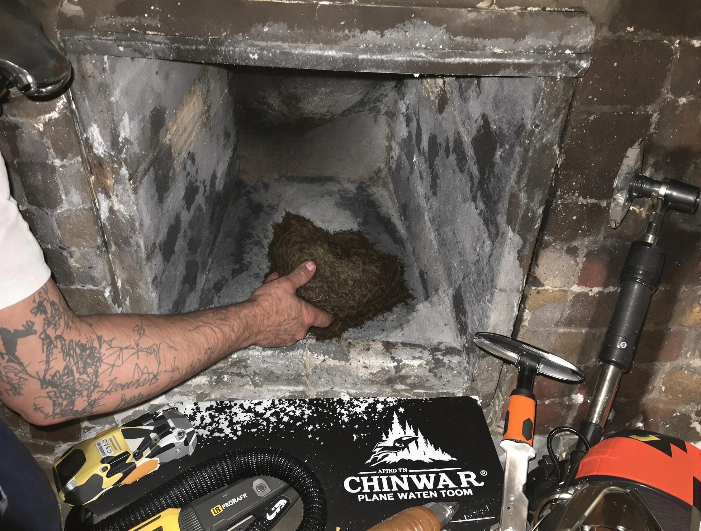 Dickson Chimney Sweep safely removing debris and screening chimney in Dickson, TN